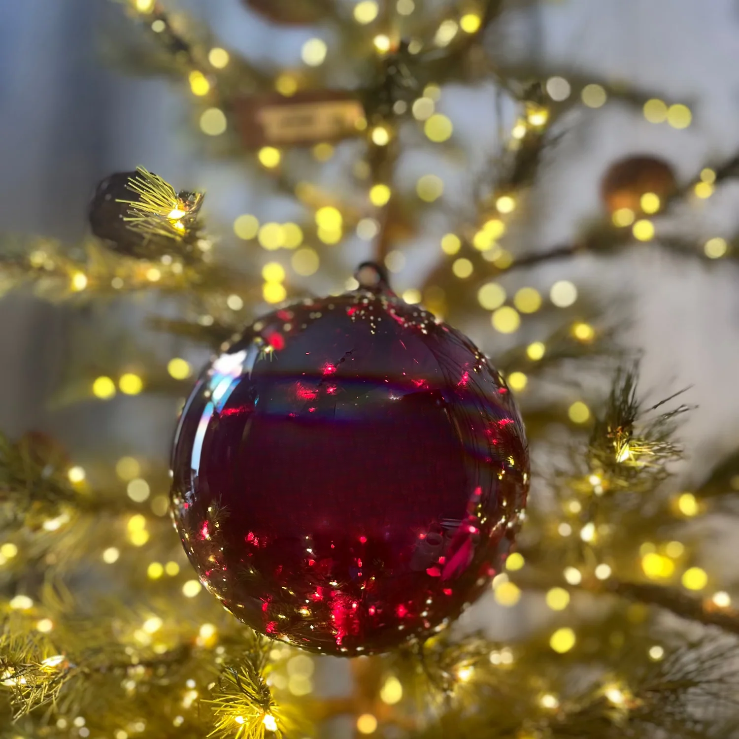 Jim Marvin Handblown Bottle Ball Glass Ornament in Purple