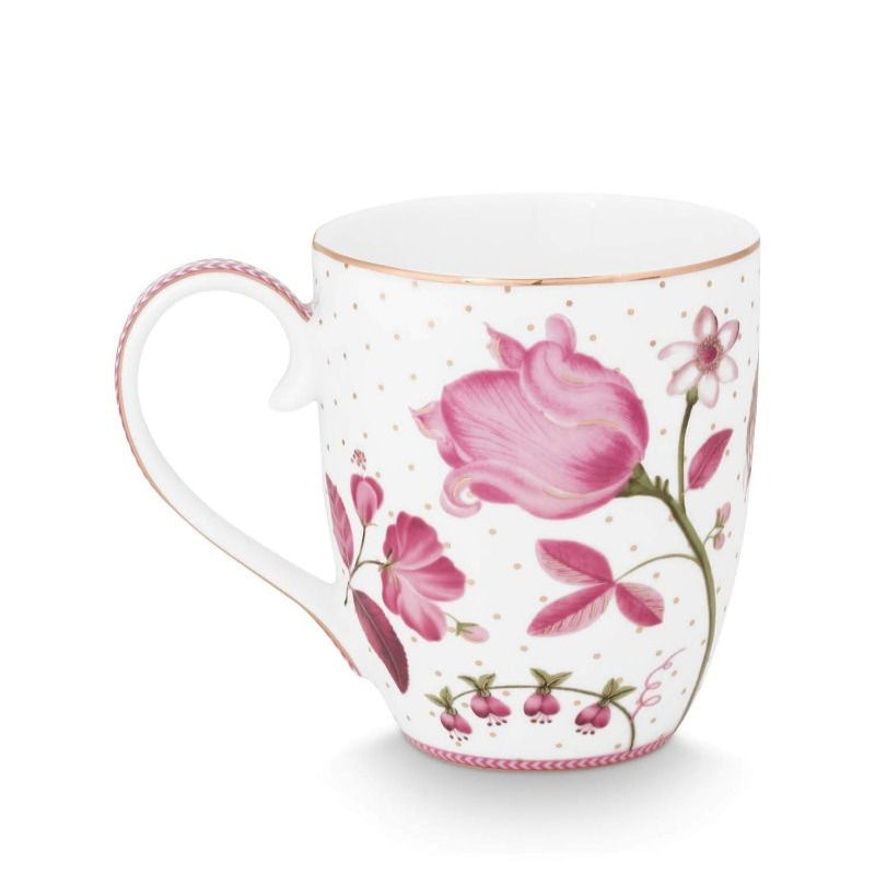 Decorative mug with floral design on a white background