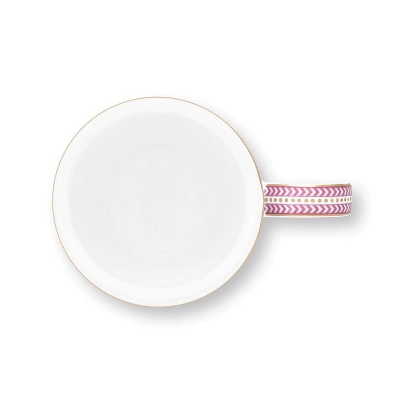 White ceramic plate with a pink decorative band on a white background