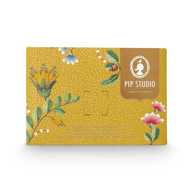 Product packaging with floral design and 'Pip Studio' branding on a white background