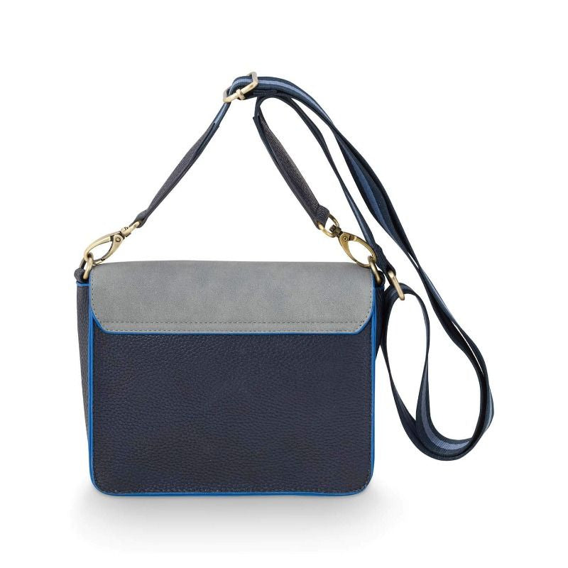 Navy blue handbag with a strap on a white background
