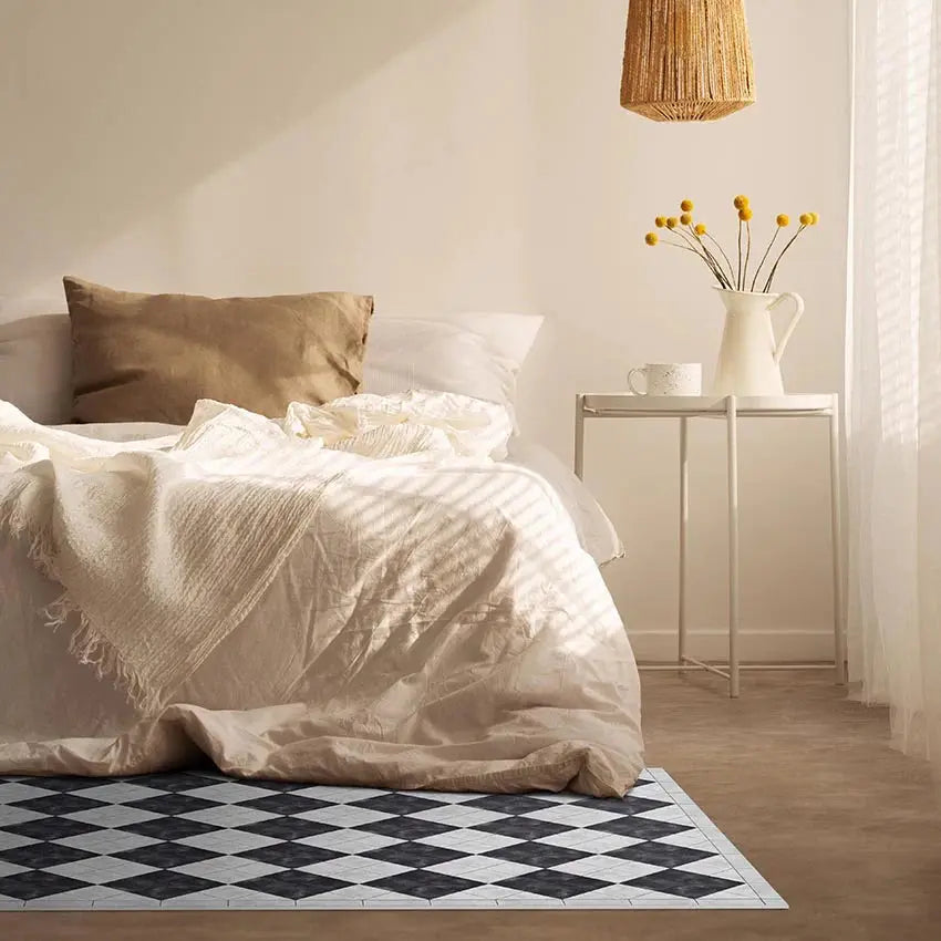 Home Smith Adama Pierrot Vinyl Rug in Black Adama Vinyl Mats