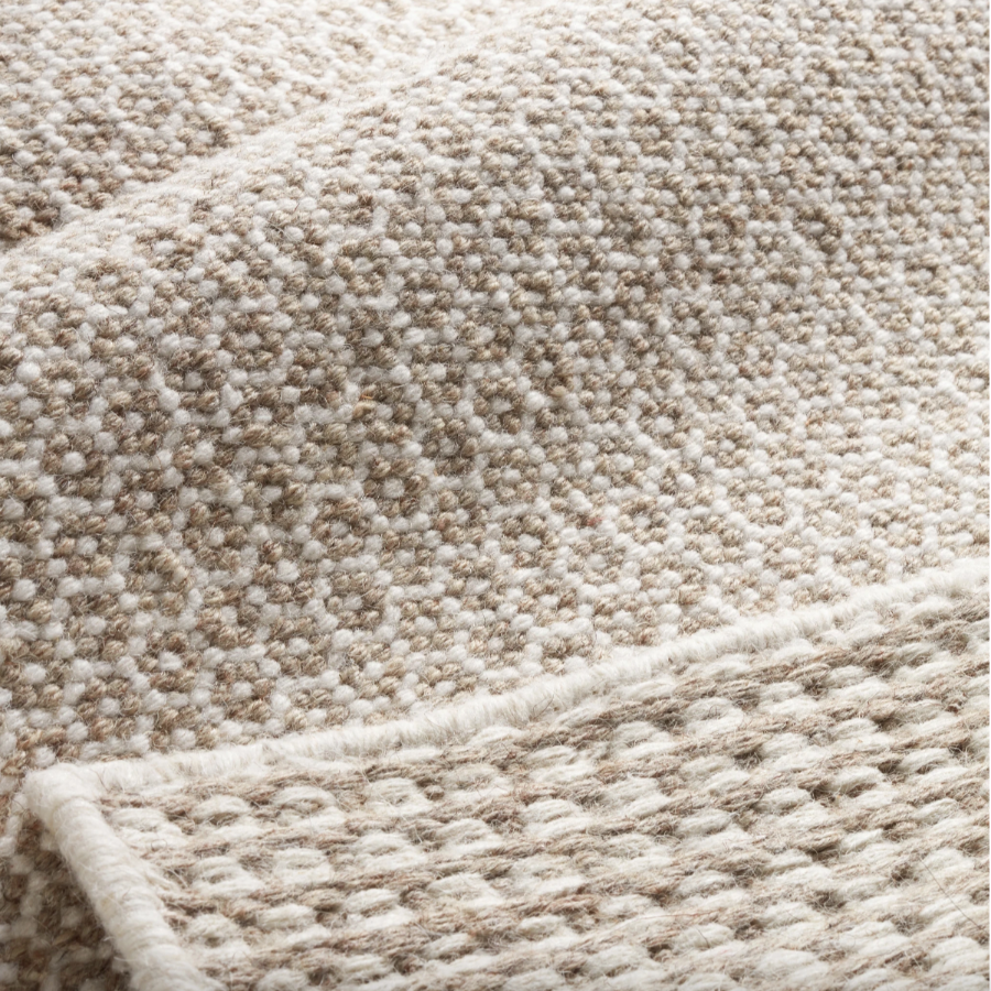 Tapis en laine tissée ivoire/gris en nid d'abeille