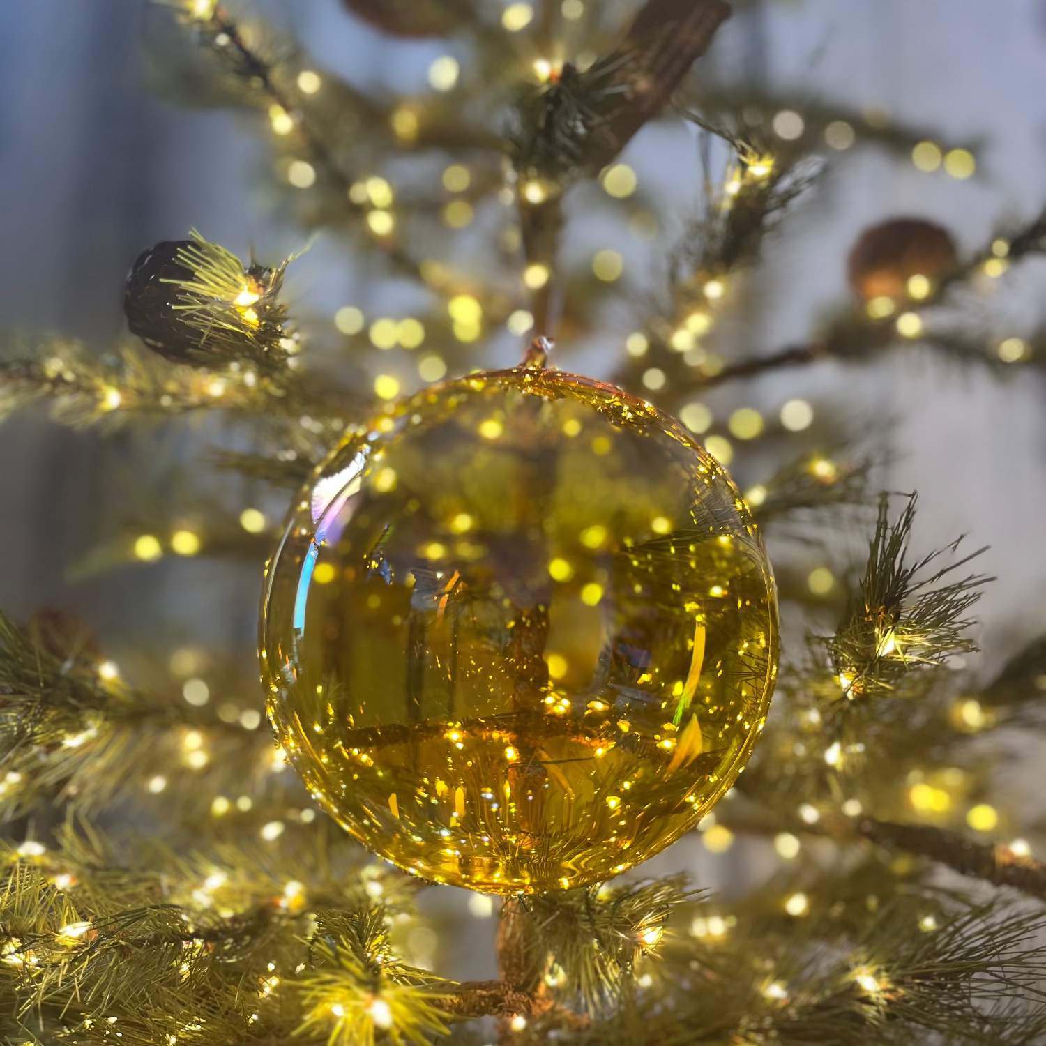 Jim Marvin Handblown Bottle Glass Ornament in Amber
