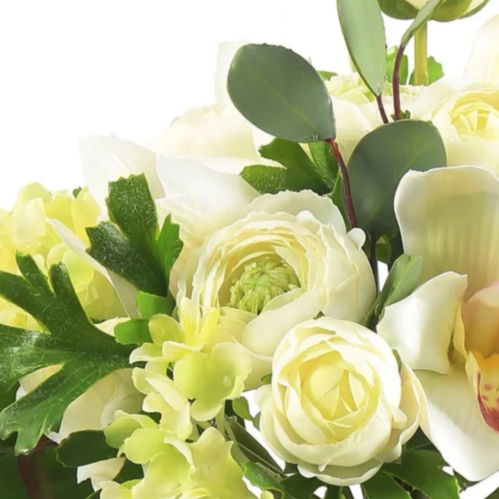 Detail of white ranunculus and orchid bouquet at Home Smith