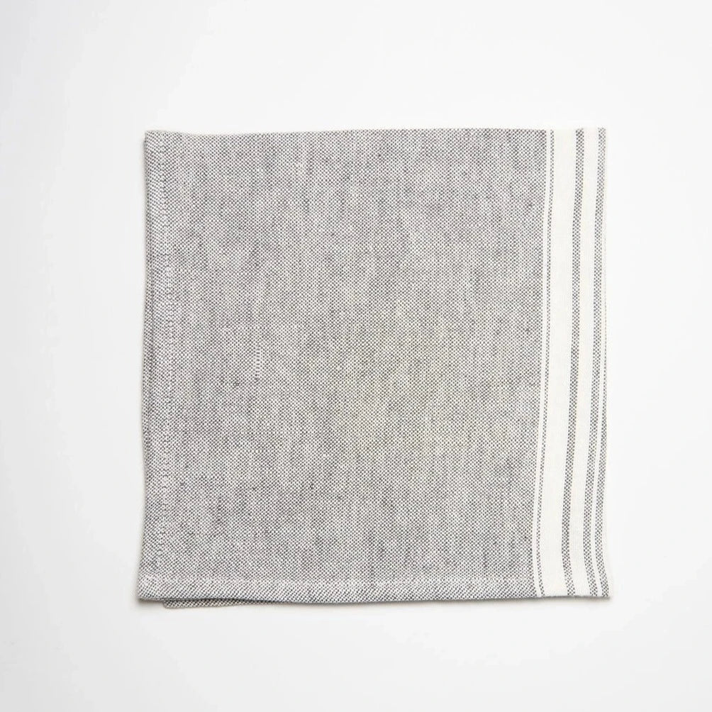 Charcoal linen napkin with white stripes at Home Smith