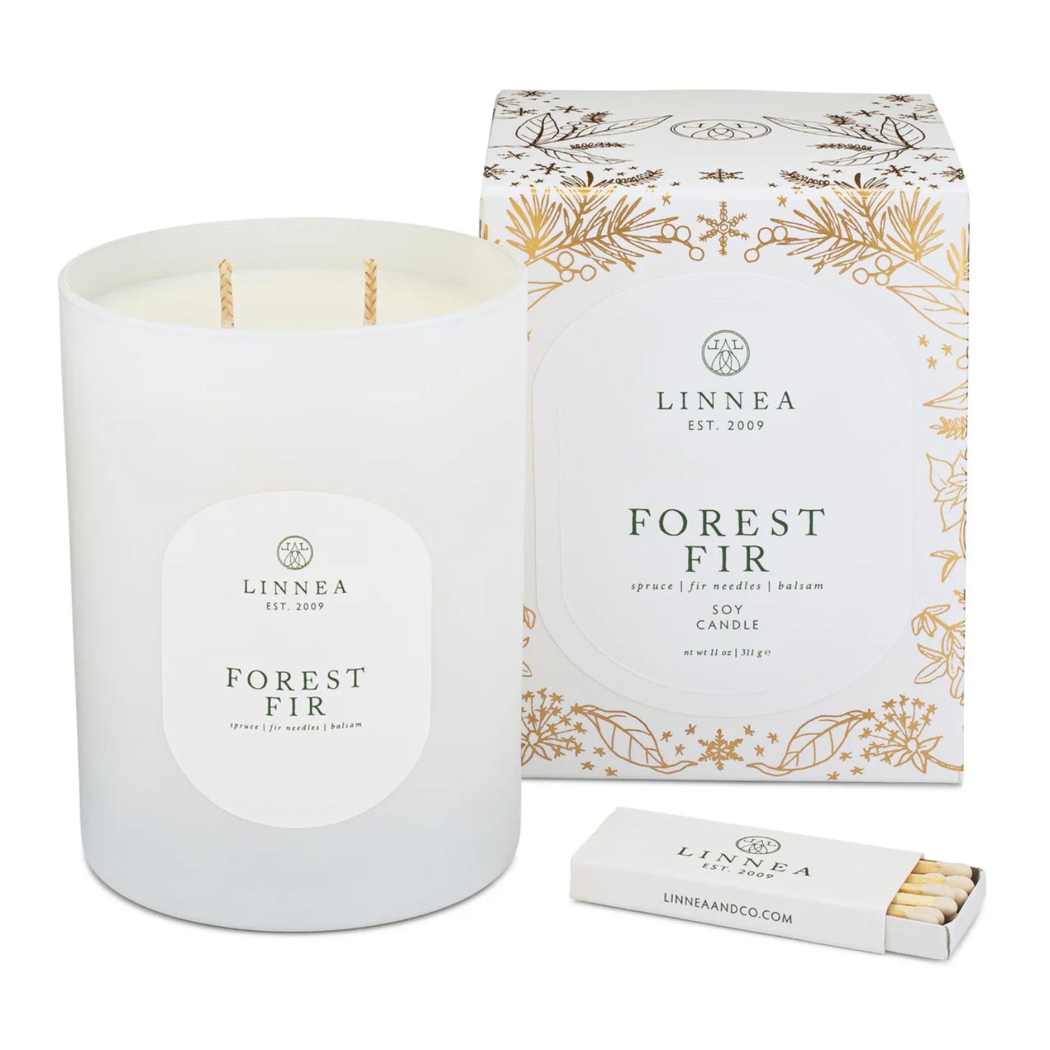 LINNEA Forest Fir candle with packaging and matches on a white background