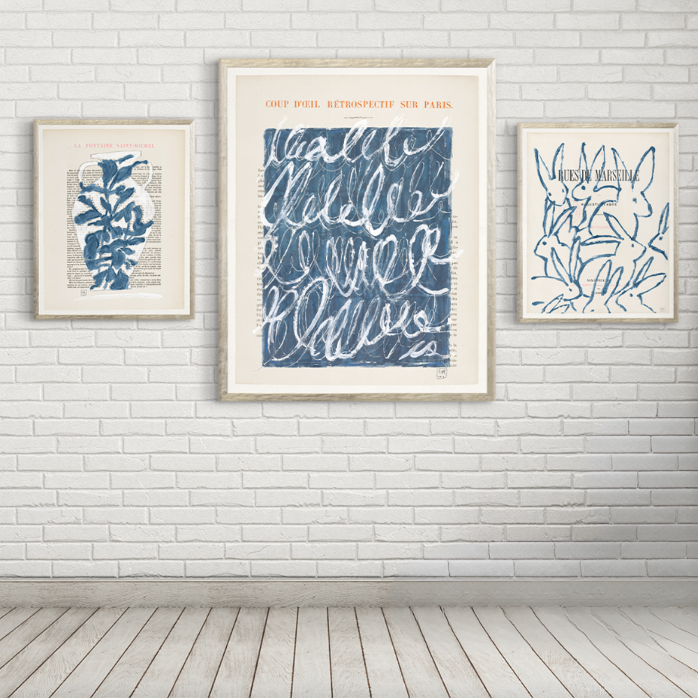 Display of three art prints available at Home Smith as part of their curated art collection. 
