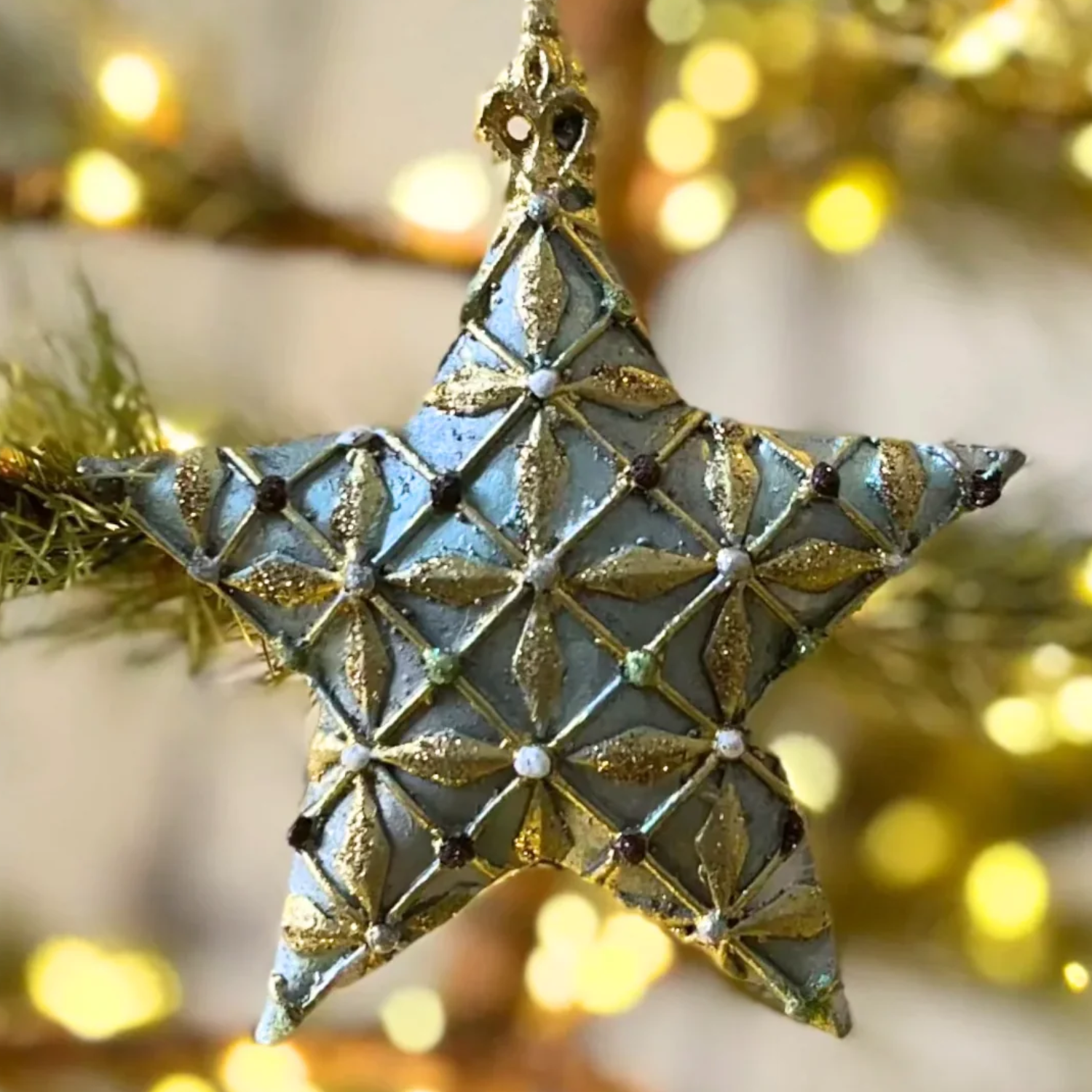 Geometric Patterned Star Holiday Ornament in Green and Gold