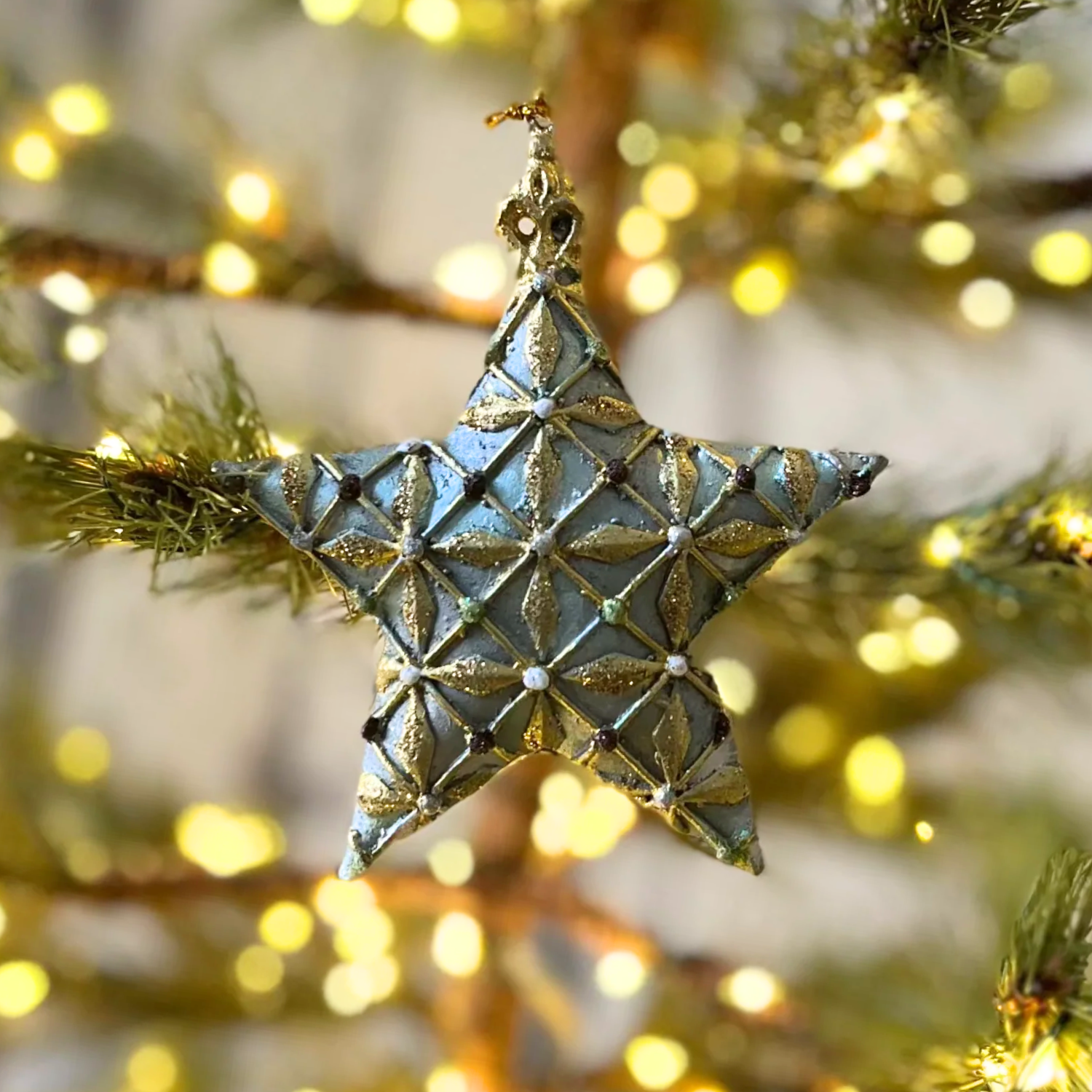 Geometric Patterned Star Holiday Ornament in Green and Gold