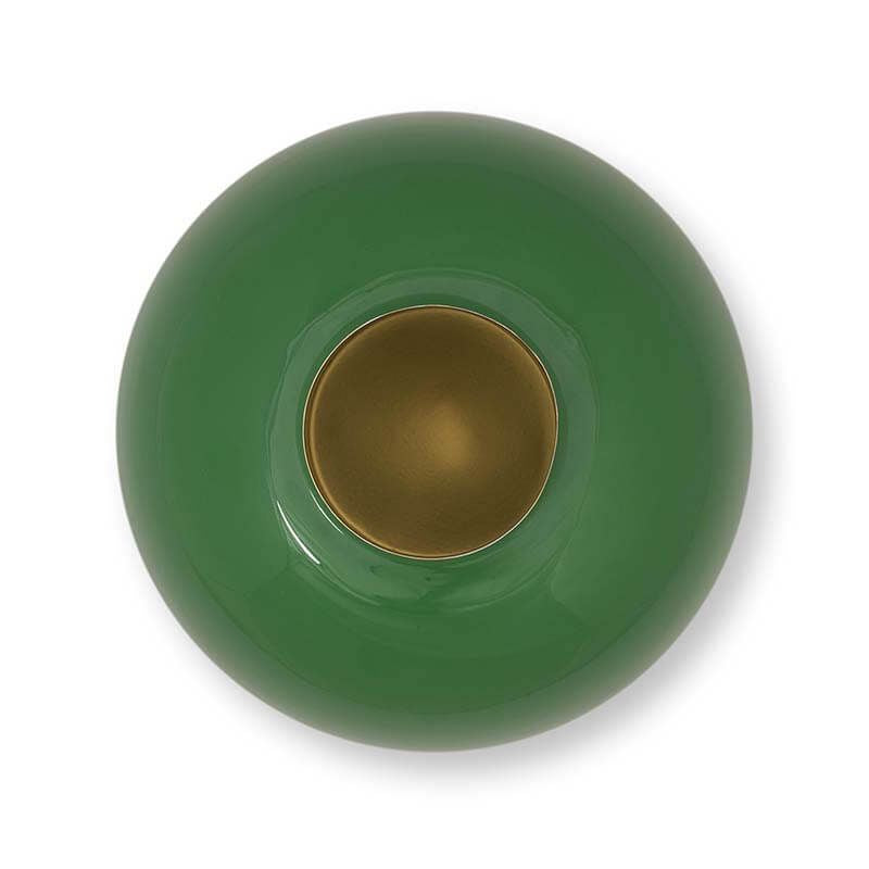Green ceramic bowl with gold interior on a white background