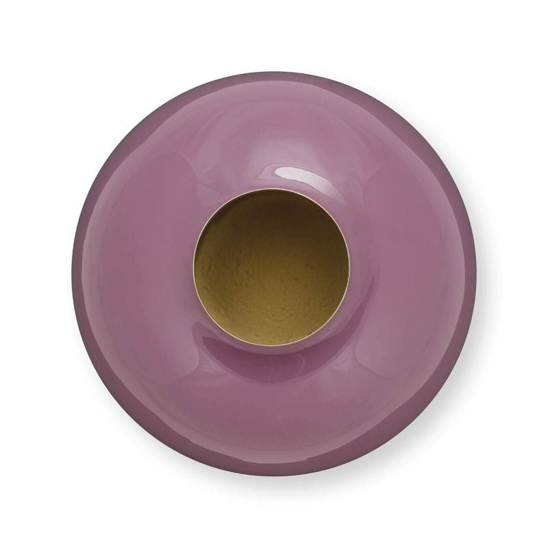 Purple candle holder with a gold interior on a white background
