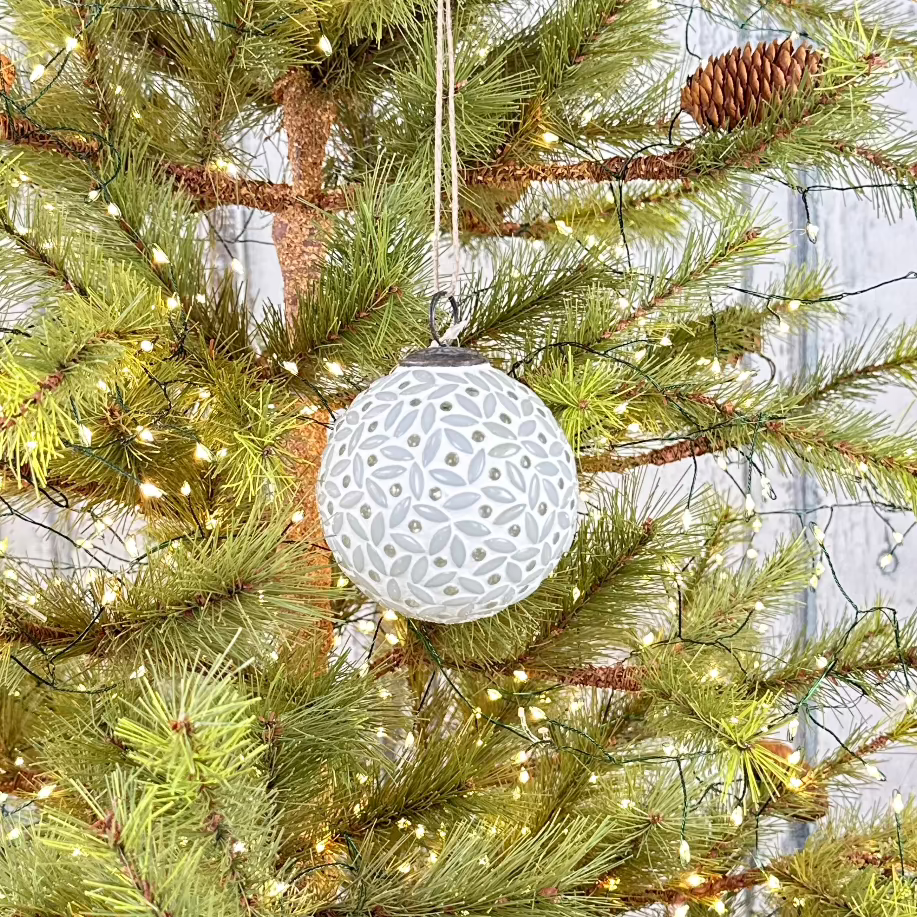 White glass ball ornament with mosaic design at Home Smith