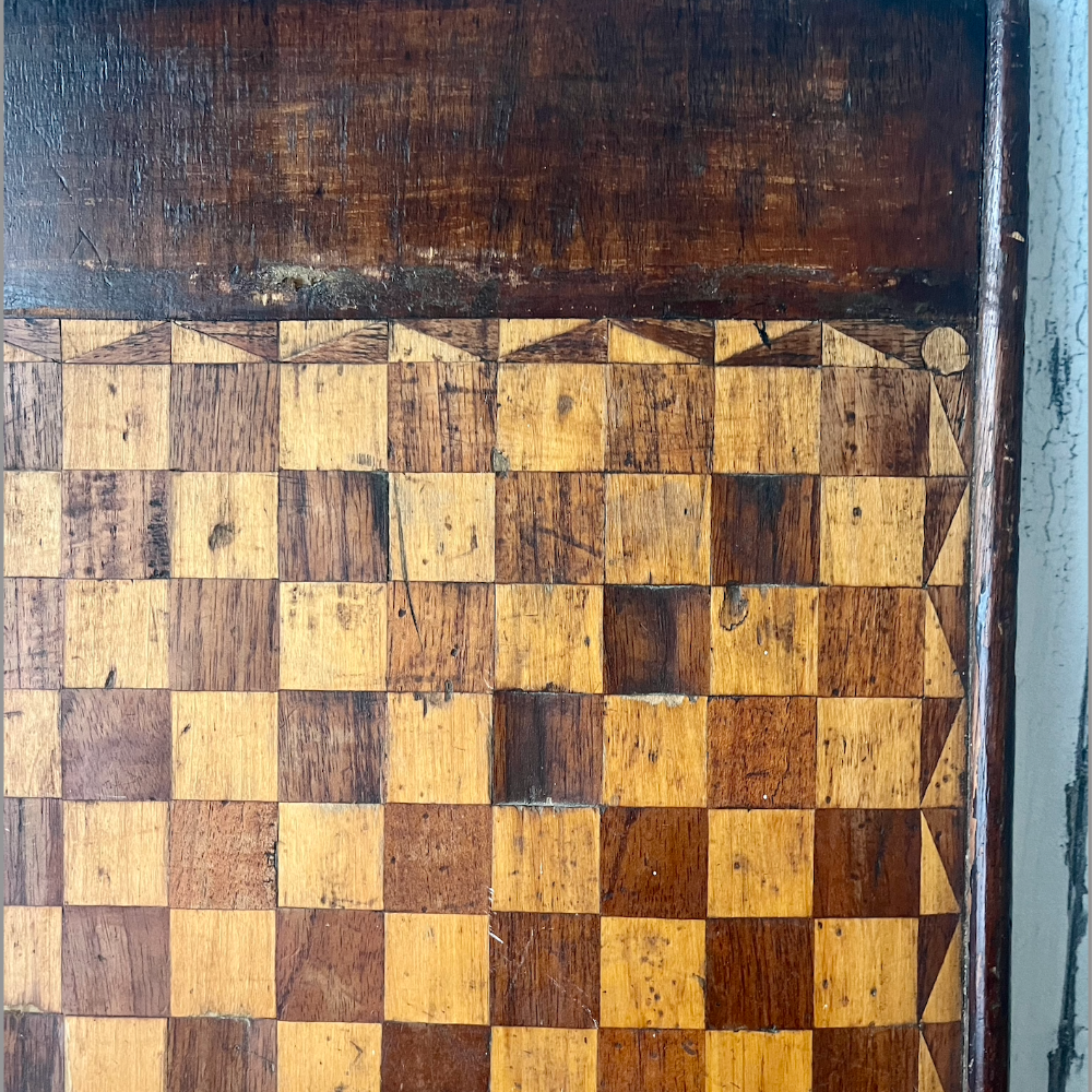 Detail of wooden antique board game at Home Smith