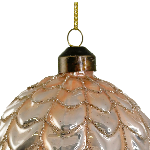 Detail of shiny pink glass ornament with champagne glitter at Home Smith