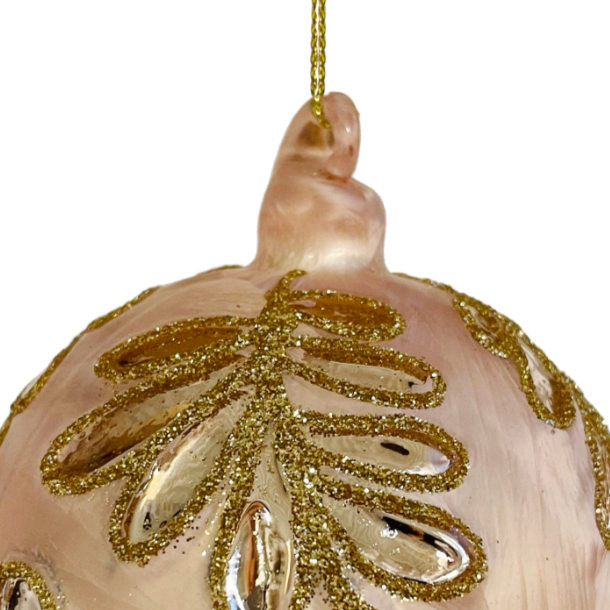 Close up of glass ball ornament with moulded pink silver leaf at Home Smith 