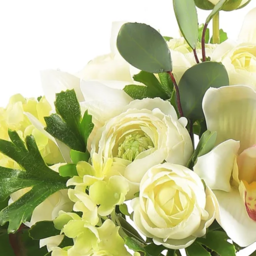 Detail of white ranunculus and orchid bouquet at Home Smith 