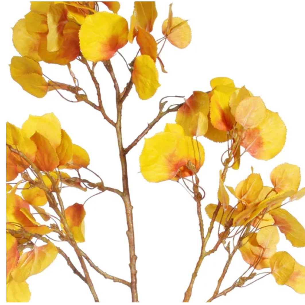 Artificial yellow flower branch on a white background