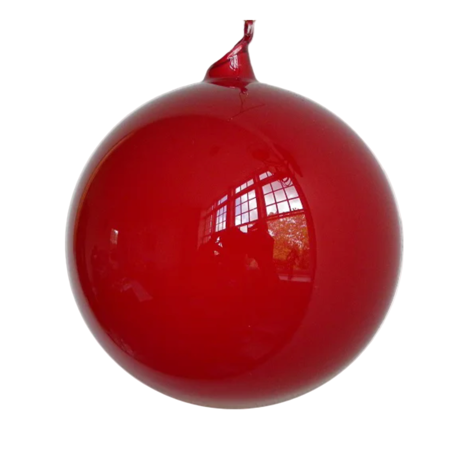 Red Christmas ornament on a white background
