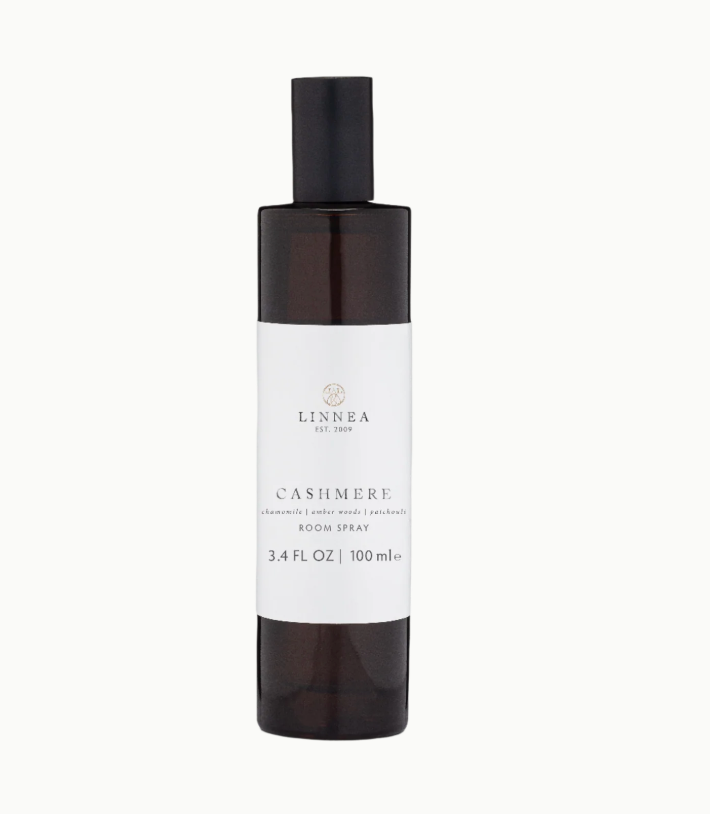 Black room spray bottle with white label on a white background