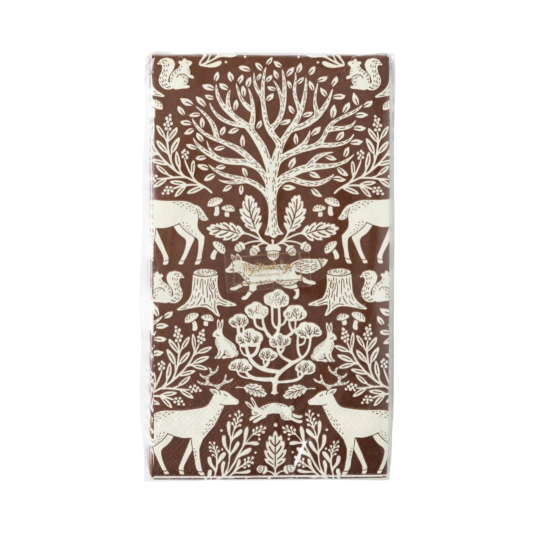 Paper Napkins with forest design featuring animals and trees on a brown background